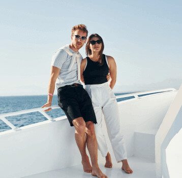 cheerful-young-couple-standing-on-the-yacht-on-the-2023-11-27-05-18-41-utc-1.jpg